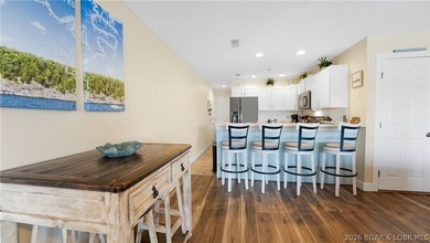 Experience the perfect blend of modern comfort & lakeside living - photo 4
