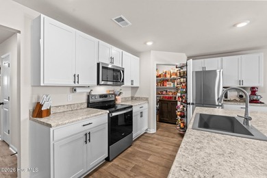 Welcome to this beautifully maintained home in Meadows at - photo 8