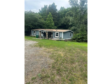 INVESTOR SPECIAL OR FIRST-TIME HOMEBUYER OPPORTUNITY! This - photo 1