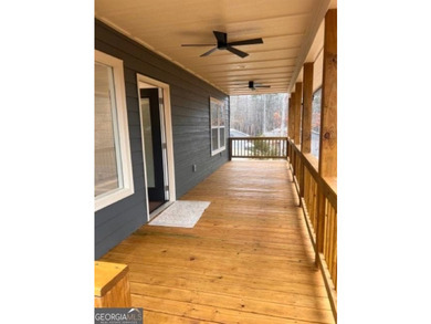 Located on a .46-acre lakefront lot in Martin, GA, 410 Lakeside - photo 32