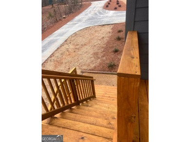 Located on a .46-acre lakefront lot in Martin, GA, 410 Lakeside - photo 36