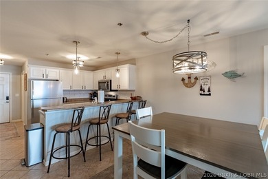 Enjoy large lake views and effortless access at this beautifully - photo 5
