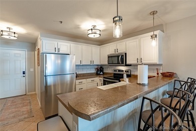 Enjoy large lake views and effortless access at this beautifully - photo 8