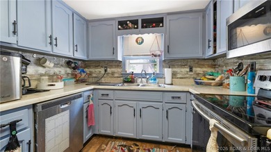 Tucked near the water in Warsaw, this 3-bedroom, 1-bath ranch - photo 4