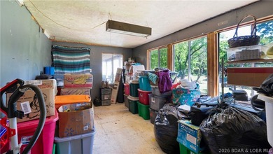 Tucked near the water in Warsaw, this 3-bedroom, 1-bath ranch - photo 6