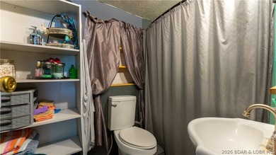 Tucked near the water in Warsaw, this 3-bedroom, 1-bath ranch - photo 10