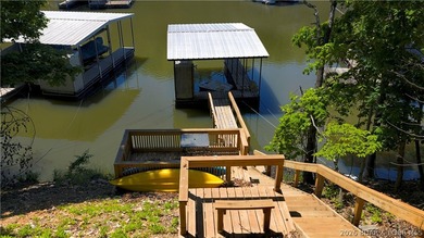 Tucked along a quiet cove at the 3 MM, 131 Walnut Drive is the - photo 2