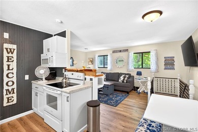 Tucked along a quiet cove at the 3 MM, 131 Walnut Drive is the - photo 5