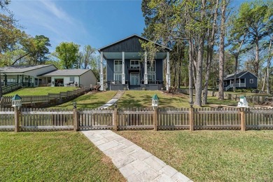 This inviting lakefront home is built for entertaining and - photo 6