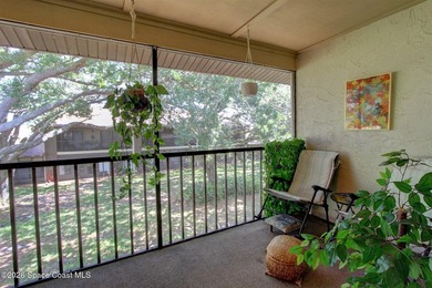 Lovely second floor condo tucked along the edge of lush - photo 27