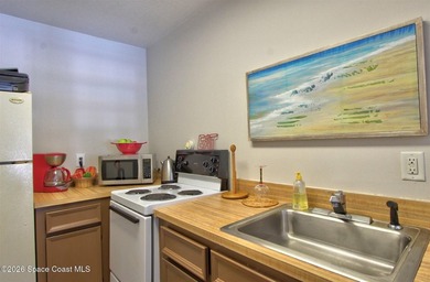 Lovely second floor condo tucked along the edge of lush - photo 40