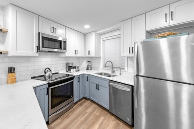 This beautifully appointed 2-bedroom, 2-bath condo is move-in or - photo 4