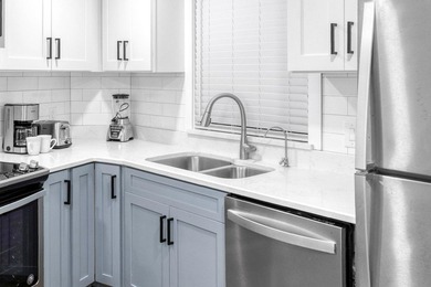 This beautifully appointed 2-bedroom, 2-bath condo is move-in or - photo 5