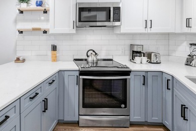 This beautifully appointed 2-bedroom, 2-bath condo is move-in or - photo 7