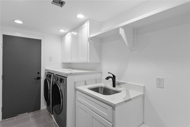 Welcome to luxury coastal living on iconic Ocean Drive, offering - photo 18