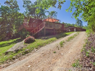Stunning lake views and immense value await at this 5-bed - photo 2