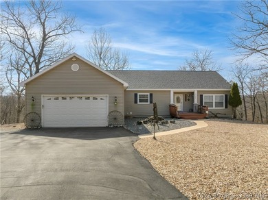 Unique country home with impressive lake views on 1.7 acres & a - photo 1