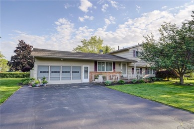 Welcome to this well-maintained split level home in Gates. Lots - photo 1