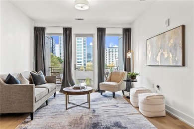 Better than new, this top-floor Midtown residence impresses with