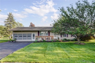 Welcome to this well-maintained split level home in Gates. Lots - photo 2