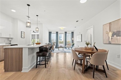 Better than new, this top-floor Midtown residence impresses with