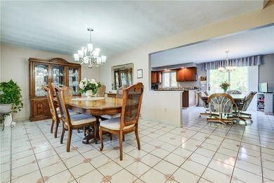 Welcome to this well-maintained split level home in Gates. Lots - photo 4