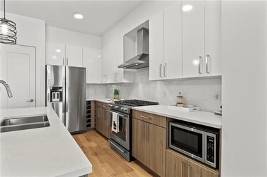 Better than new, this top-floor Midtown residence impresses with