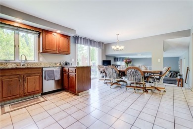 Welcome to this well-maintained split level home in Gates. Lots - photo 6