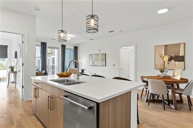 Better than new, this top-floor Midtown residence impresses with