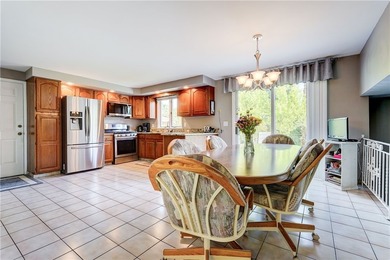 Welcome to this well-maintained split level home in Gates. Lots - photo 9