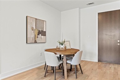 Better than new, this top-floor Midtown residence impresses with