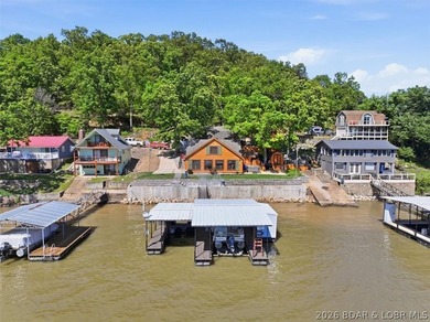 Discover a revitalized lakefront getaway situated at the 61.5 - photo 1