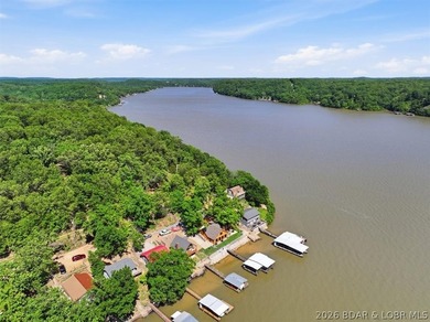 Discover a revitalized lakefront getaway situated at the 61.5 - photo 2