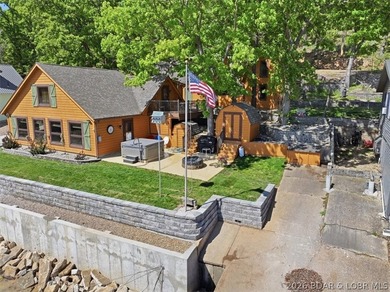 Discover a revitalized lakefront getaway situated at the 61.5 - photo 3