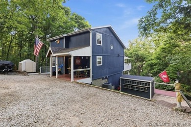 This stunning 4-bedroom, 3-bathroom lake home offers the perfect - photo 2