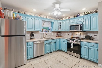 This stunning 4-bedroom, 3-bathroom lake home offers the perfect - photo 4