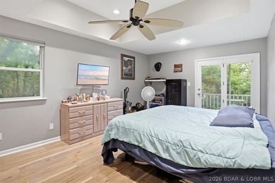 This stunning 4-bedroom, 3-bathroom lake home offers the perfect - photo 10