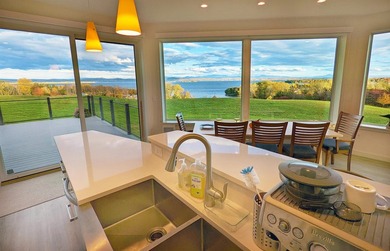 Enjoy the BEST sweeping panoramic views of Lake Champlain and - photo 2