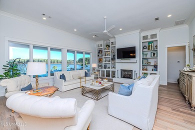 Poised along the water's edge in the prestigious Reunion Golf