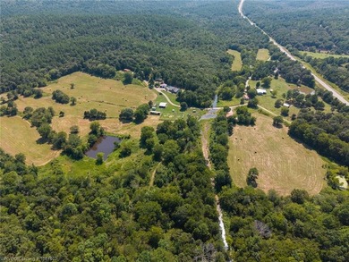 Nestled on 30 pristine acres and bordered on two sides by the - photo 9