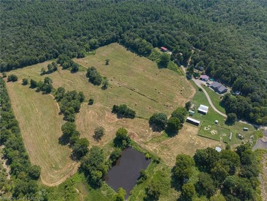 Nestled on 30 pristine acres and bordered on two sides by the - photo 10