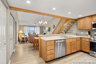Experience the ultimate Lake of the Ozarks lifestyle in this - photo 6