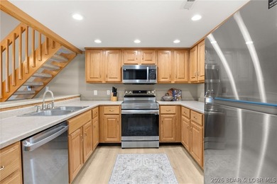 Experience the ultimate Lake of the Ozarks lifestyle in this - photo 7