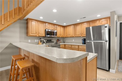 Experience the ultimate Lake of the Ozarks lifestyle in this - photo 8