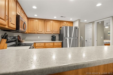 Experience the ultimate Lake of the Ozarks lifestyle in this - photo 9