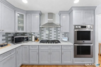This one will amaze you! Kitchen has been totally remodeled with - photo 10