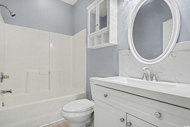 This welcoming 2-bedroom, 2-bath first-floor end-unit condo sits - photo 12