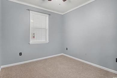 This welcoming 2-bedroom, 2-bath first-floor end-unit condo sits - photo 15