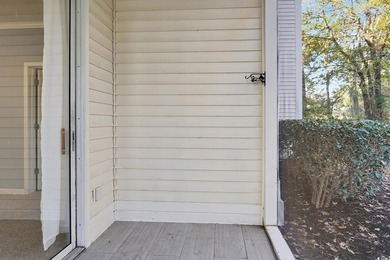 This welcoming 2-bedroom, 2-bath first-floor end-unit condo sits - photo 17