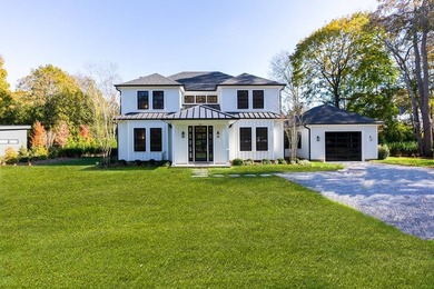 Welcome to 166 Ferry Rd, a luxurious black and white batten - photo 1